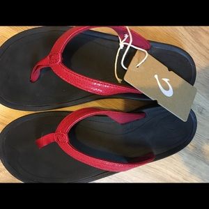 Olukai. Crimson and black flip flops. New!